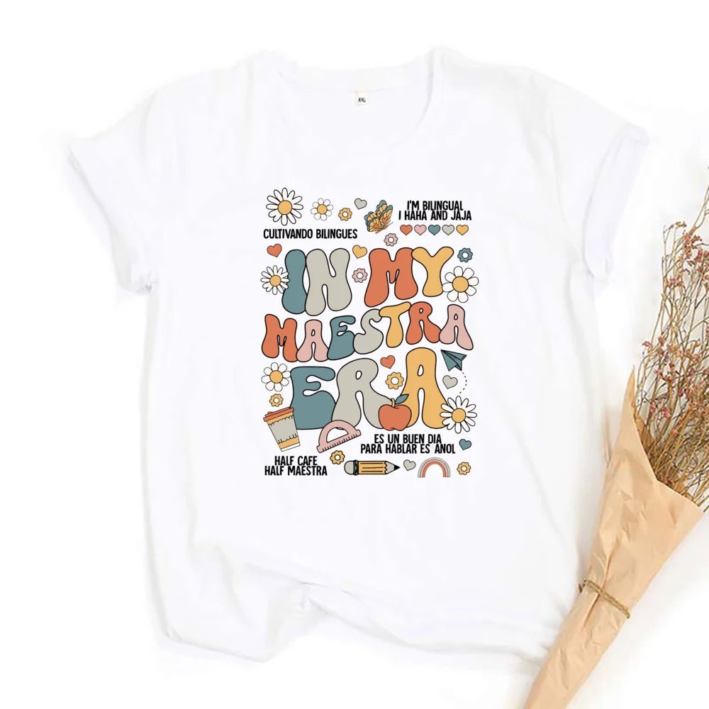 "In My Maestra Era" T-Shirt - TeachingTeez.com. Boho pastel theme.  Featuring flowers, rainbows, and a variety of other designs. Shop today at teachingteez.com!