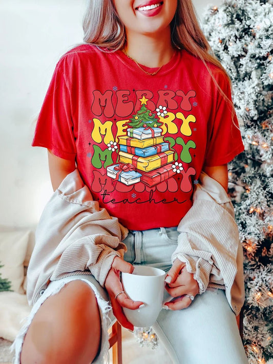 Merry Teacher Christmas Book Stack T-Shirt – Festive Holiday Apparel for Teachers | TeachingTeez.com - TeachingTeez.com