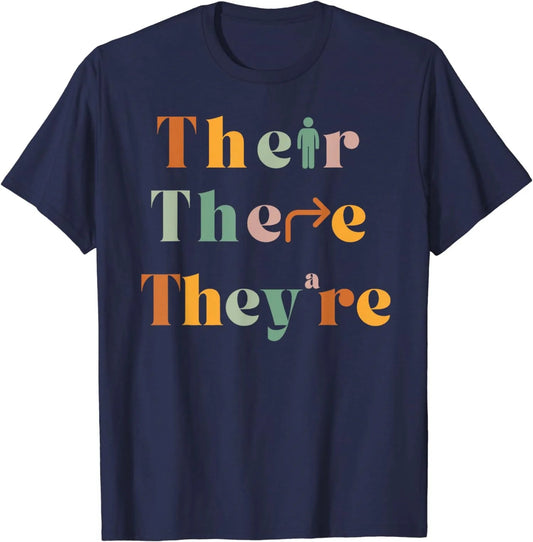 A navy "Their, There, They're" T-Shirt from TeachingTeez.com with colorful lettering that humorously illustrates the difference between these commonly confused words. Ideal for grammar enthusiasts, teachers, and language lovers who enjoy a clever twist on grammar. Order this fun educational tee from TeachingTeez.com and wear your grammar pride!